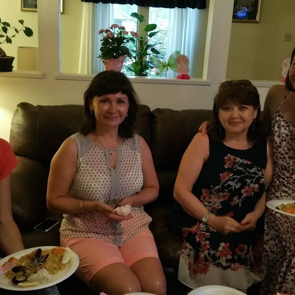 Paella Chef - three women sitting on a couch with plates of food - Caterers Near Me - Houston, Texas Paella Chef - three women sitting on a couch with plates of food - Caterers Near Me - Houston, Texas