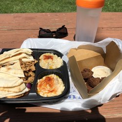 Jasmine - Chicken shawarma platter with green salad instead of rice, babaganoush, hummus, falafel poppers.