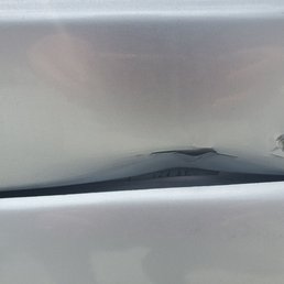 Damage to the lower driver door Damage to the lower driver door