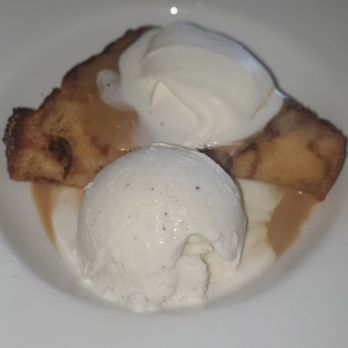The Gladly - Whiskey Bread Pudding with whipped cream and ice cream - New American Near Me - Phoenix, Arizona