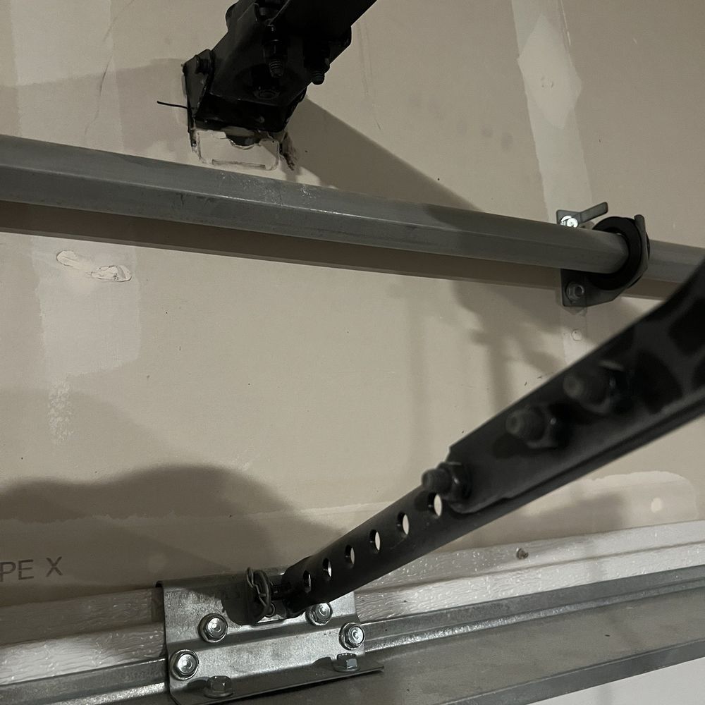 Melikson Garage Door - This was the original failure of the drywall when the tension springs failed. - Garage Door Services Near Me - Santa Clara, California Melikson Garage Door - This was the original failure of the drywall when the tension springs failed. - Garage Door Services Near Me - Santa Clara, California