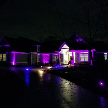 Todd's Services - Difficult to capture, but this is some of our landscape lighting.  We decided on purple for the photo, but we can change them to any color. - Landscaping Near Me - Hamburg, Michigan