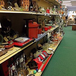 Four Echoes - Shelving area with a variety of items