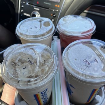 Dutch Bros Coffee - A strawberry smoothie drink, two coffee drinks, and a vanilla freeze - Coffee & Tea Near Me - Surprise, Arizona