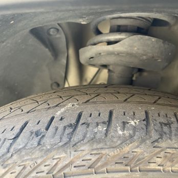 Longo Toyota - Tire on front driver side. Notice the tread is extremely worn down. - Car Dealers Near Me - El Monte, California Longo Toyota - Tire on front driver side. Notice the tread is extremely worn down. - Car Dealers Near Me - El Monte, California