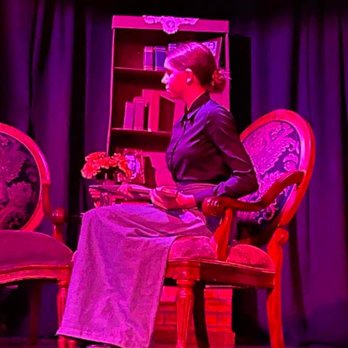 Something New Studio - a woman sitting in a chair - Performing Arts Near Me - Eustis, Florida Something New Studio - a woman sitting in a chair - Performing Arts Near Me - Eustis, Florida