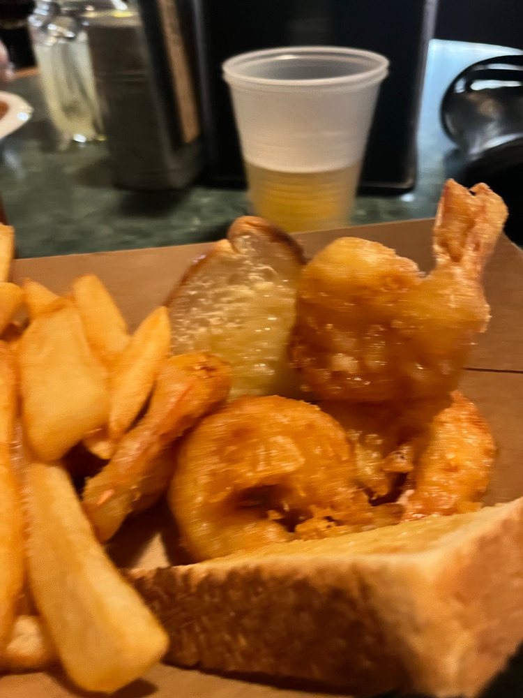 The Front Porch Bar And Grill Logo