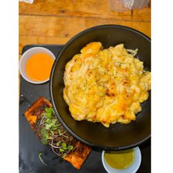 1111 Sports bar and grill - Mac and cheese had good flavor. And that green sauce taste good.