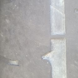 Avis Rent A Car - Tread wear indicator nearly gone.