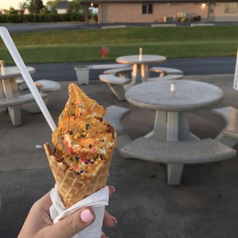 Twist - a person holding a cone of ice cream with sprinkles - Ice Cream & Frozen Yogurt Near Me - Greenville, Wisconsin Twist - a person holding a cone of ice cream with sprinkles - Ice Cream & Frozen Yogurt Near Me - Greenville, Wisconsin