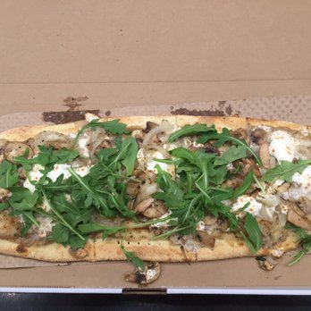 &pizza - Moonstruck (delicious!) - garlic ricotta sauce, mushroom truffle sauce, mozzarella, goat cheese, onion, mushrooms + we added arugula - Pizza Near Me - Washington, DC, District of Columbia