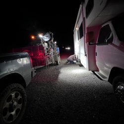 Emergency Road Service & Diesel Repair - Tire changing at night.