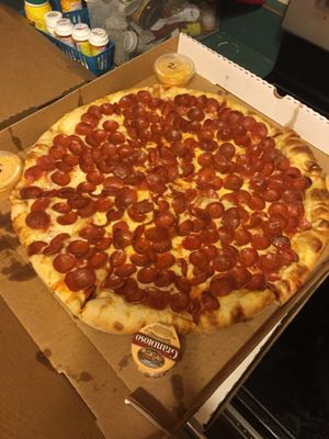 Photo of Dawg House Pizza - Monrovia, IN, US. a pepperoni pizza in a box