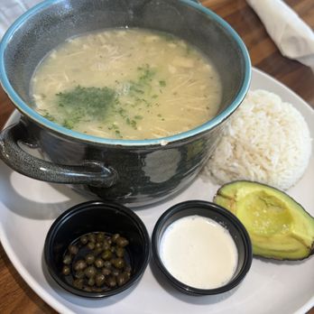 Curuba - Ajiaco a creamy chicken soup with rice avocado capers and crema - Latin American Near Me - Allen, Texas