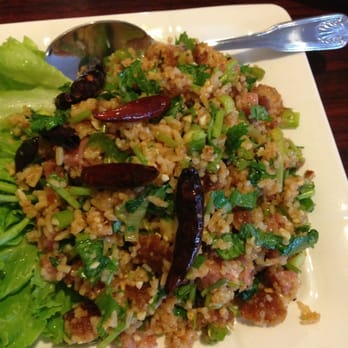 Sue's Kitchen - Nam kao $6.95. Rice w/ cilantro, green onion, marinated "sour" pork with bits of fried pork skin. Tasty& hearty-still refreshing - Thai Near Me - El Sobrante, California Sue's Kitchen - Nam kao $6.95. Rice w/ cilantro, green onion, marinated "sour" pork with bits of fried pork skin. Tasty& hearty-still refreshing - Thai Near Me - El Sobrante, California