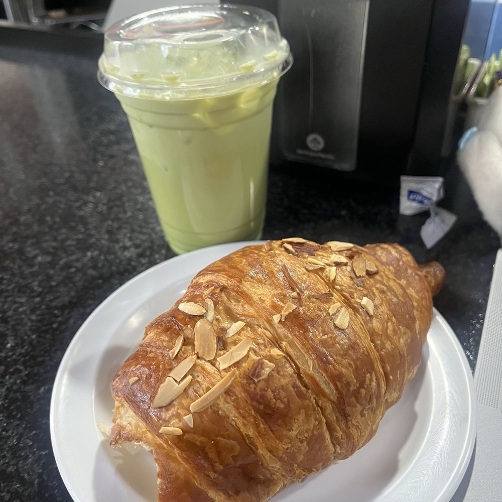 Almond croissant and matcha latte Almond croissant and matcha latte