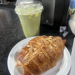 Almond croissant and matcha latte Almond croissant and matcha latte