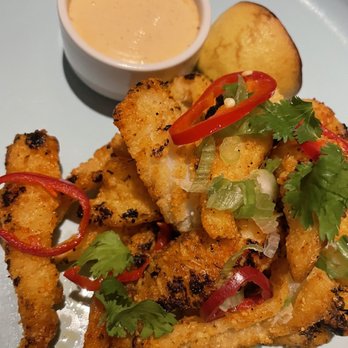SALTLIK Calgary. - a plate of deep fried food - Steakhouses Near Me - Calgary, Alberta