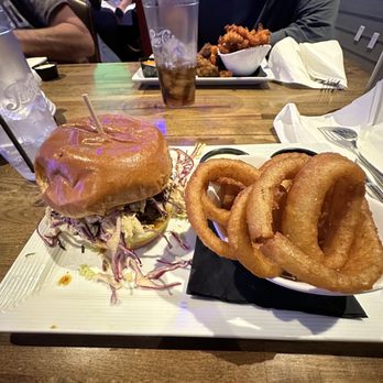 The Porch - Nashville Chicken Sammy. Side of onion rings. - Cocktail Bars Near Me - Tempe, Arizona The Porch - Nashville Chicken Sammy. Side of onion rings. - Cocktail Bars Near Me - Tempe, Arizona