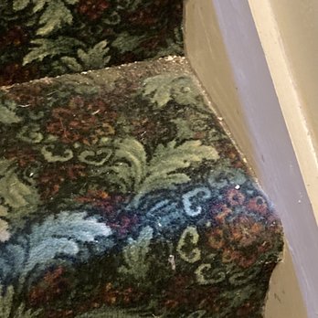 Mud Street Cafe - Stairs with years of scunge in the corners - Cafes Near Me - Eureka Springs, Arkansas