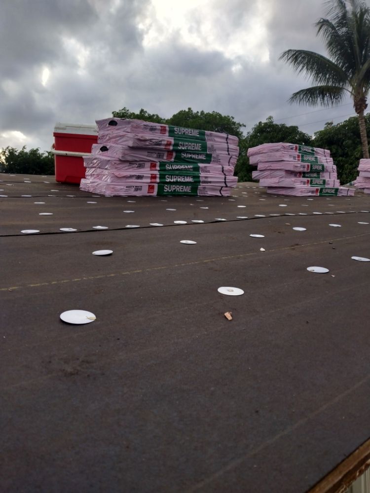 Slide of Carlos Roofing