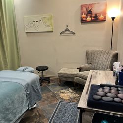 Massage Customs - Relaxing room with stones and cupping