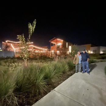 kitchen747 - Back side of the restaurant-make sure to check out the patio equipped with fire pits w/seating and cornhole. Very cozy. - Pizza Near Me - Roseville, California