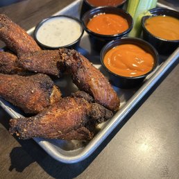 Dry Rub Wings with an Assortment of Sauces Dry Rub Wings with an Assortment of Sauces