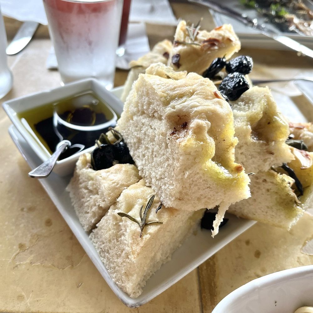 Burrata Bistro - Olive and garlic focaccia - Italian Near Me - Poulsbo, Washington Burrata Bistro - Olive and garlic focaccia - Italian Near Me - Poulsbo, Washington