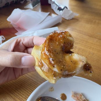 Dirty Cajun Seafood Kitchen - A bite of shrimp - Cajun/Creole Near Me - Bedford, Texas