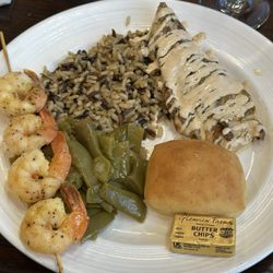 Perdido Queen Riverboat & Dinner Cruise - Shrimp skewers, rice, green beans, a roll, and chicken w a sauce