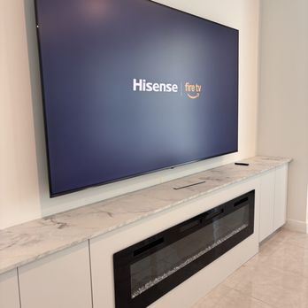 Skyline Pro Service - 100" inch tv mount with concealed wiring. Custom tv with fireplace - General Contractors Near Me Skyline Pro Service - 100" inch tv mount with concealed wiring. Custom tv with fireplace - General Contractors Near Me