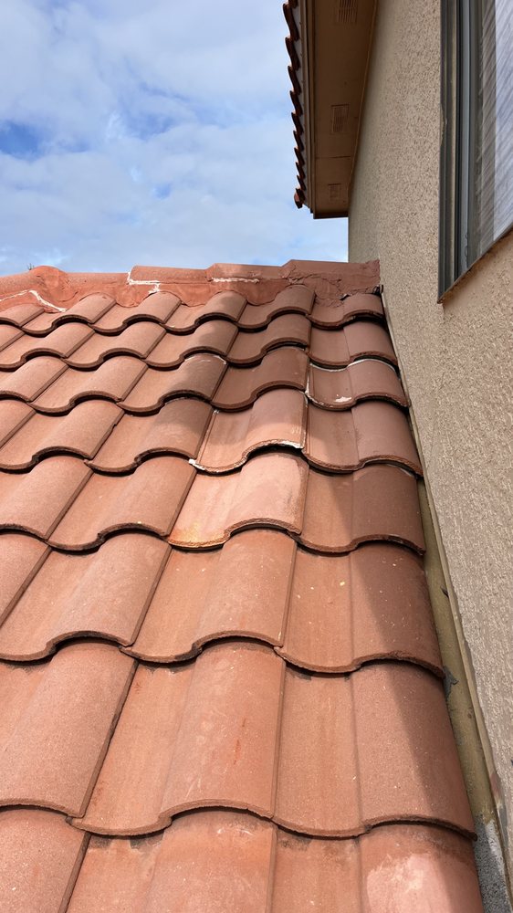 Slide of Unique Roofers