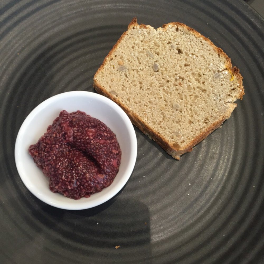 Pando Cafe - Protein bread with rasberry chia jam - protein bread is made with sprouted seeds and nuts - Coffee & Tea Near Me - Brisbane, QLD