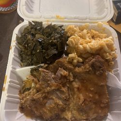 Smothered pork chops, Mac n cheese, greens