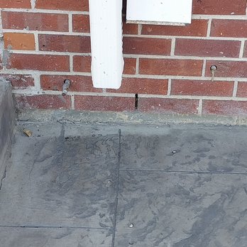 Sevenly Outdoor Living - Slab not level with house foundation. Lots of concrete and sealant overspray. - Decks & Railing Near Me - Aurora, Colorado Sevenly Outdoor Living - Slab not level with house foundation. Lots of concrete and sealant overspray. - Decks & Railing Near Me - Aurora, Colorado