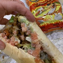 Lennys Grill & Subs - Nashville Hot Chicken Philly sandwich with some of them hot Cheetos