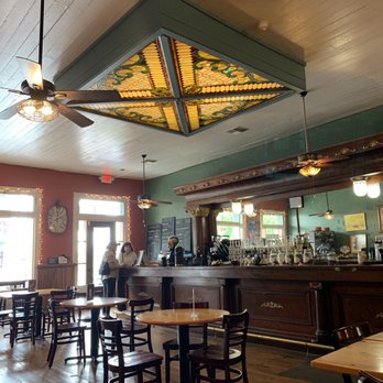 The Tilted Windmill - Beautiful wooden bar (serving gourmet teas and coffees) and stained glass ceiling fixture. - Cafes Near Me - Brenham, Texas The Tilted Windmill - Beautiful wooden bar (serving gourmet teas and coffees) and stained glass ceiling fixture. - Cafes Near Me - Brenham, Texas