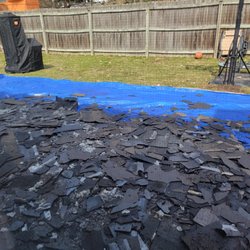 Chris James Teschendorf - Tarp to help contain debris