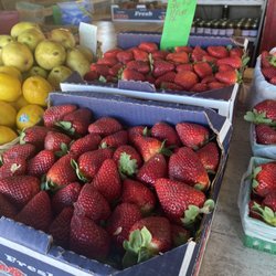 Norman's Fruit Stand - Strawberries. $20 for a half flat, $7 for a quart, $4 for a pint