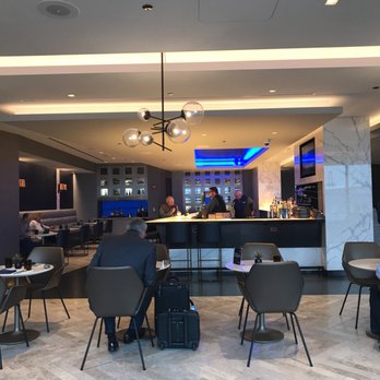 United First Class International Lounge - Complimentary bar & table service - Airport Lounges Near Me - Chicago, Illinois United First Class International Lounge - Complimentary bar & table service - Airport Lounges Near Me - Chicago, Illinois