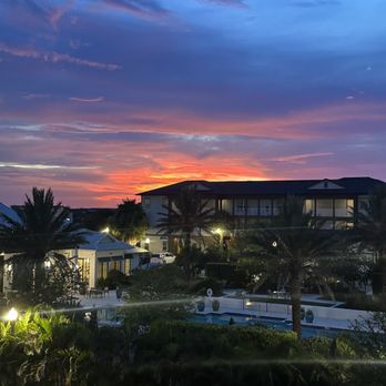 IMT Sonoma Hills - The pool area of the clubhouse and sunset - Apartments Near Me - Winter Garden, Florida