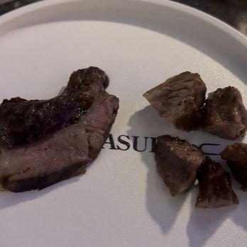 Churasuko - Rib finger and ribeye cap. Pretty well done... - Brazilian Near Me - Tysons, Virginia