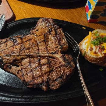 Outback Steakhouse - Porterhouse Steak & fully loaded baked potato - Steakhouses Near Me - San Bernardino, California Outback Steakhouse - Porterhouse Steak & fully loaded baked potato - Steakhouses Near Me - San Bernardino, California