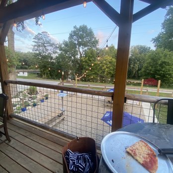 950 Speakeasy Bistro - a pizza on a plate on a patio - Pizza Near Me - Lagro, Indiana