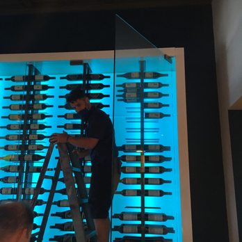 Oceans 234 - Stocking the wine cooler - New American Near Me - Deerfield Beach, Florida Oceans 234 - Stocking the wine cooler - New American Near Me - Deerfield Beach, Florida