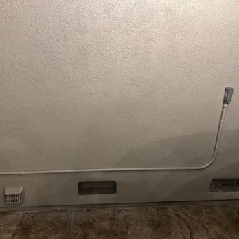 Top Rank Electric - Electrical wire for EV charger on outside wall - Electricians Near Me Top Rank Electric - Electrical wire for EV charger on outside wall - Electricians Near Me