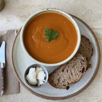 Marmo - House-made tomato bisque with seedy toast and whipped butter. Our soup specials rotate; call for our current options! - Cafes Near Me - Shelton, Washington