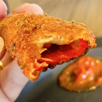 Pizza Vino - Inside view of a "Jalapeño Popper Fiesta" with its red jalapeño. Very tasty. - Pizza Near Me - High Point, North Carolina Pizza Vino - Inside view of a "Jalapeño Popper Fiesta" with its red jalapeño. Very tasty. - Pizza Near Me - High Point, North Carolina