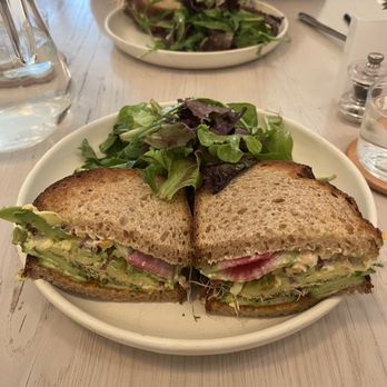 THE WELL Kitchen & Table - Vegetable Tree Hugger Sandwich on sourdough - Breakfast & Brunch Near Me - New York, New York THE WELL Kitchen & Table - Vegetable Tree Hugger Sandwich on sourdough - Breakfast & Brunch Near Me - New York, New York